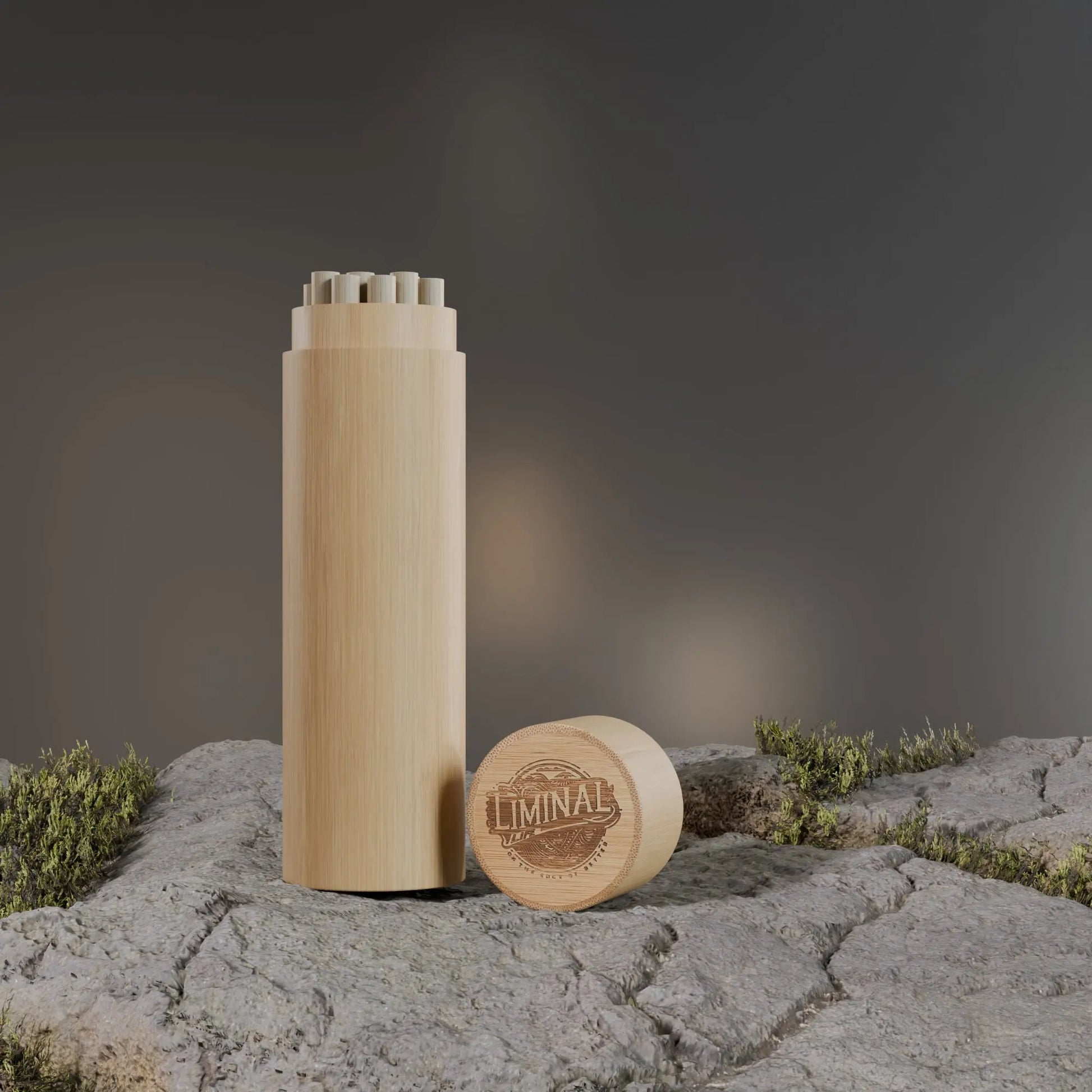 Liminal Life Sustain-a-Straws bamboo straws showcased on rocky environment covered in moss.